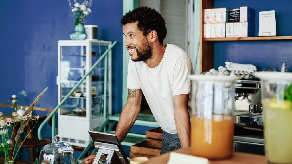 Barista smiling in coffee shop