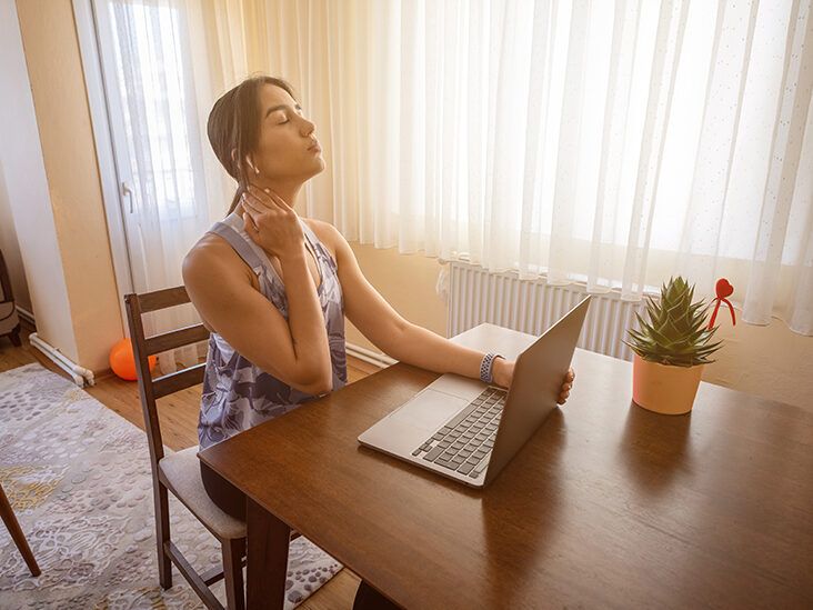 https://media.post.rvohealth.io/wp-content/uploads/sites/4/2021/10/woman-neck-pain-working-from-home-laptop-732x549-thumbnail-732x549.jpg