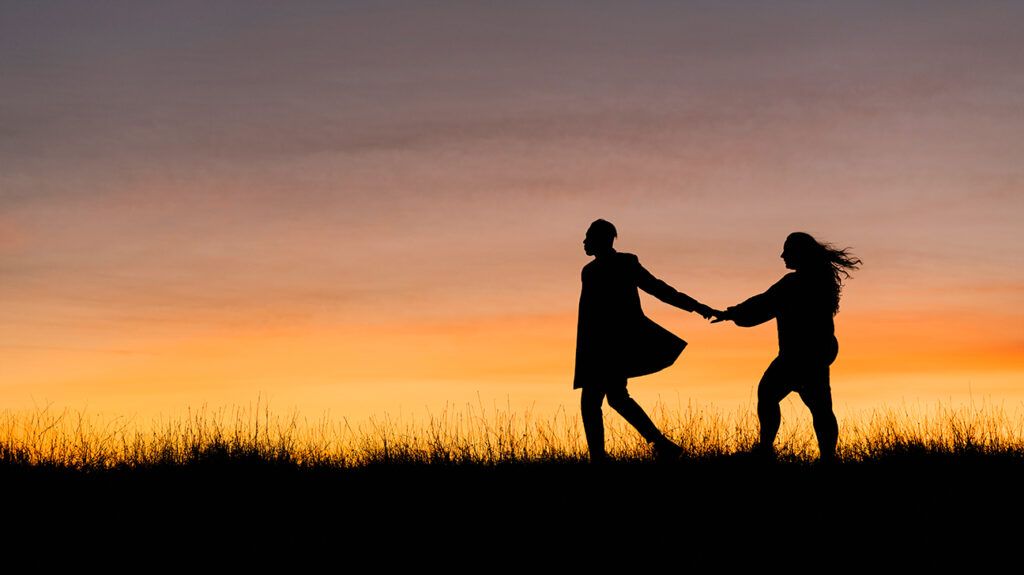 silhouette of couple, one is trying to see if they like the person or just attached