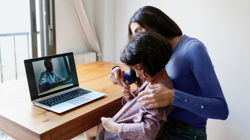 Parent and child at telehealth visist