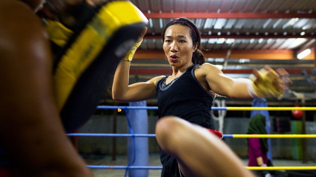 Divorcee doing kickboxing to help with divorce depression