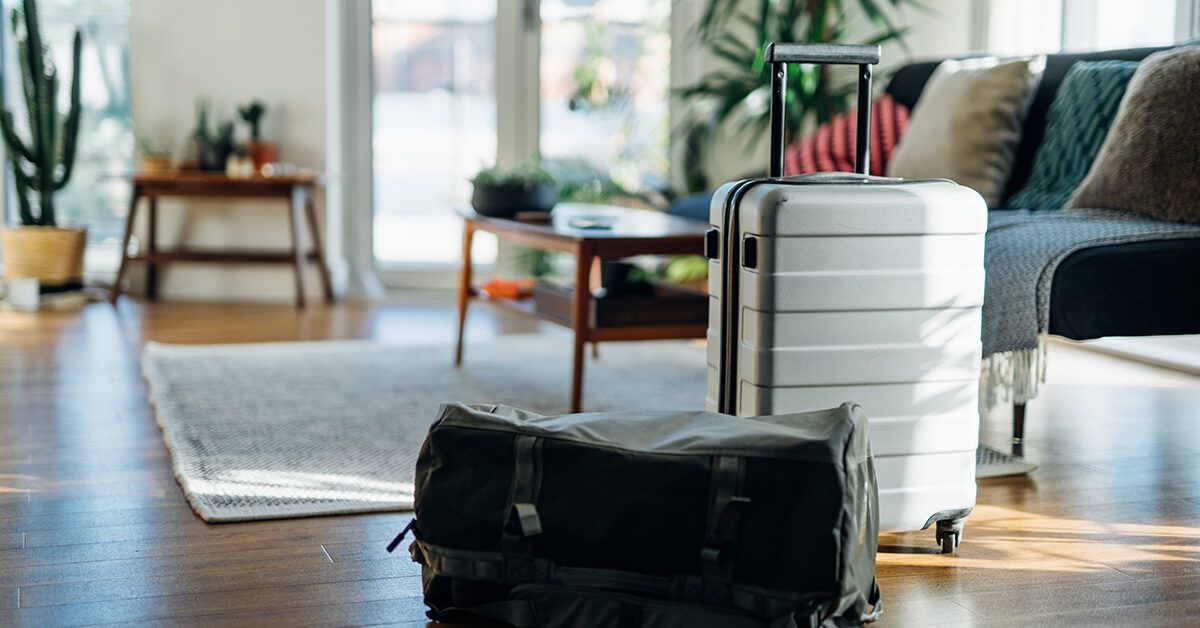 https://media.post.rvohealth.io/wp-content/uploads/sites/4/2022/02/suitcase-luggage-on-floor-apartment-home-1200x628-facebook-1200x628.jpg