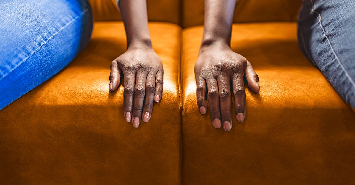 https://media.post.rvohealth.io/wp-content/uploads/sites/4/2022/03/couple-close-up-hands-on-couch-sofa-not-touching-1200x628-facebook-1200x628.jpg
