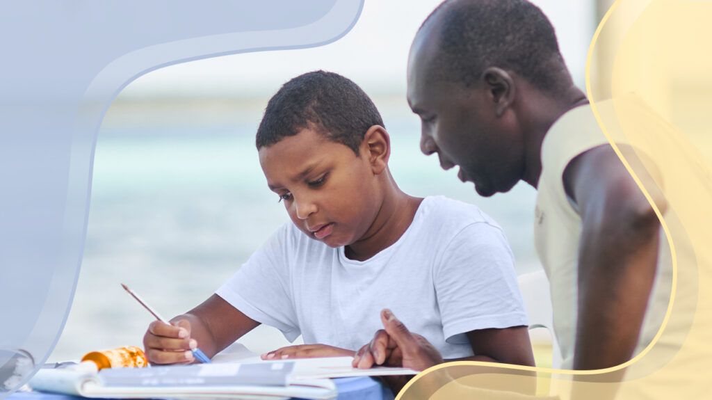 Father helping son with homework