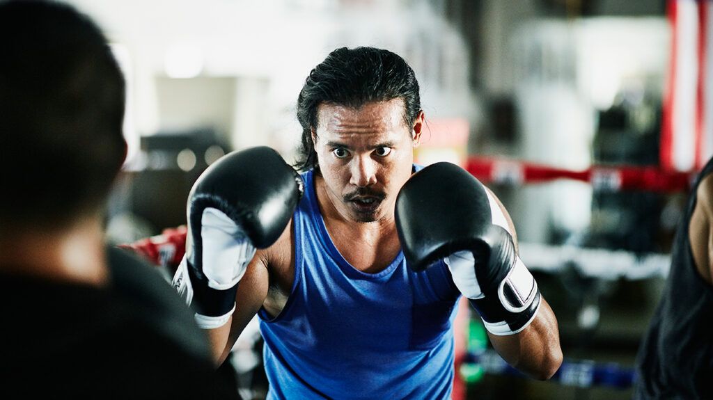 Man boxing while in the proverbial zone, the flow state