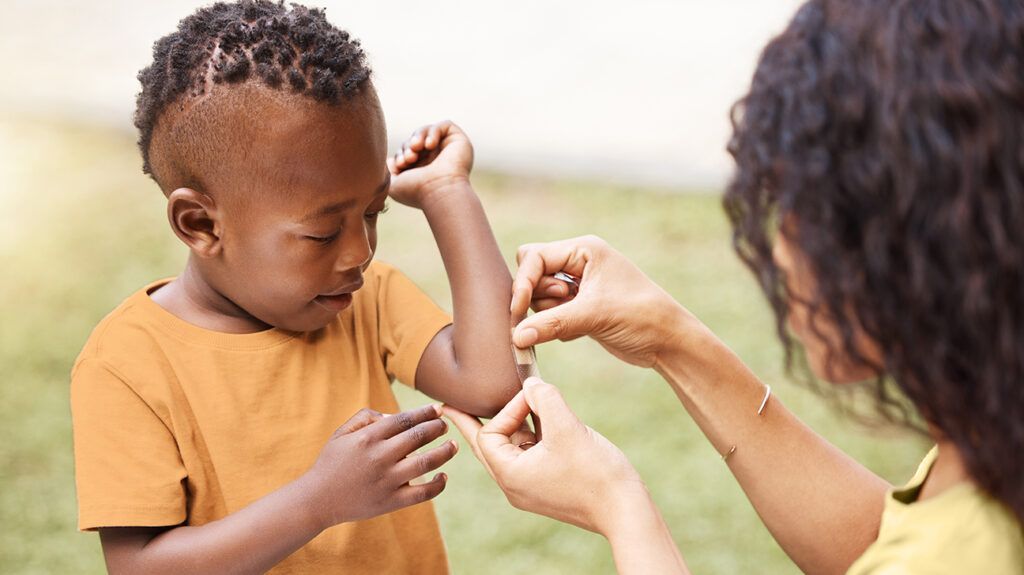 Young boy experiencing health anxiety, insisting on a Band-Aid