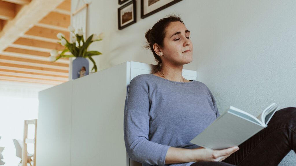 Woman journaling, to help heal after spouse cheated