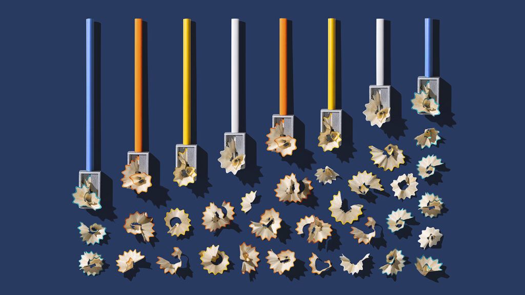 a row of eight pencils being sharpened with pencil shavings