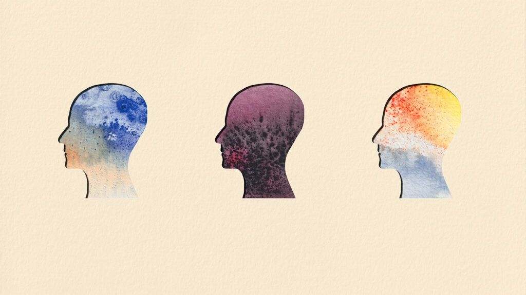 Head profiles, different colors and patterns, symbolic of neurodiversity at work