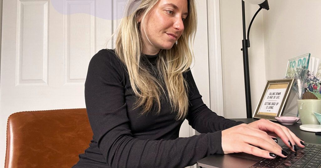 The author works on her computer from home.