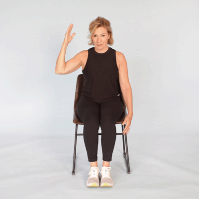 A GIF of someone living with COPD performs the chair exercise: ear to shoulder.