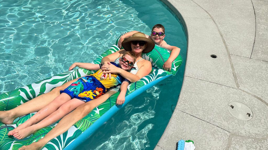 image of a woman and her kids in a swimming pool