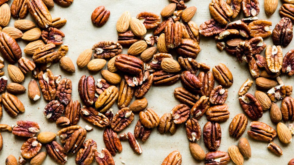 Nuts, like almonds and pecans, can help lower cholesterol