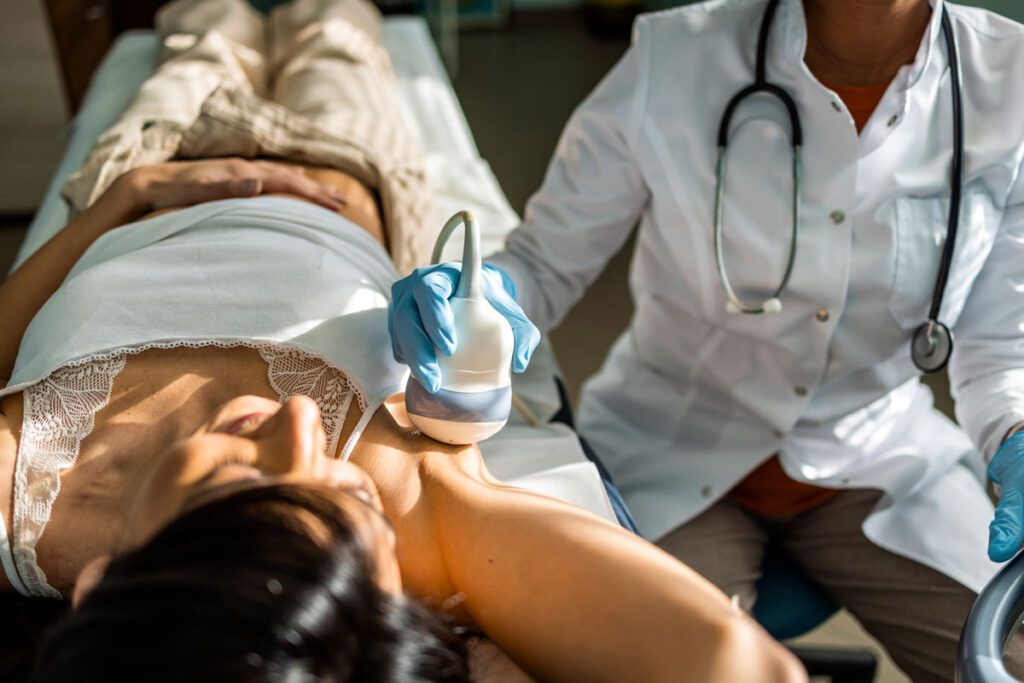 Woman getting an ultrasound breast exam