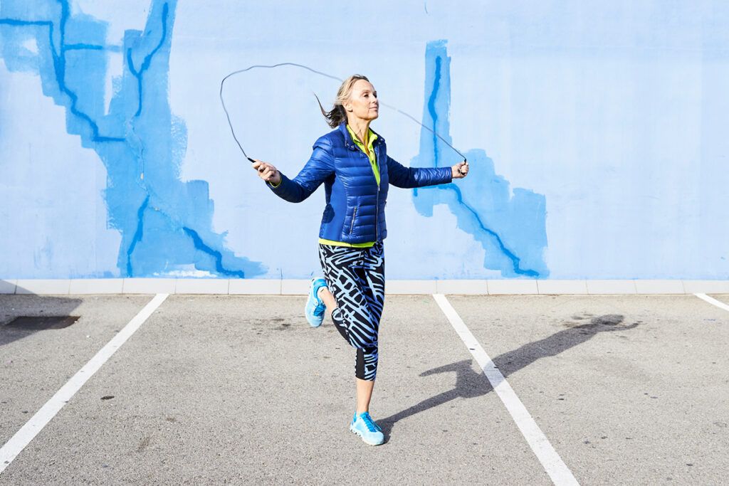 Middle age woman jumping rope for cholesterol levels