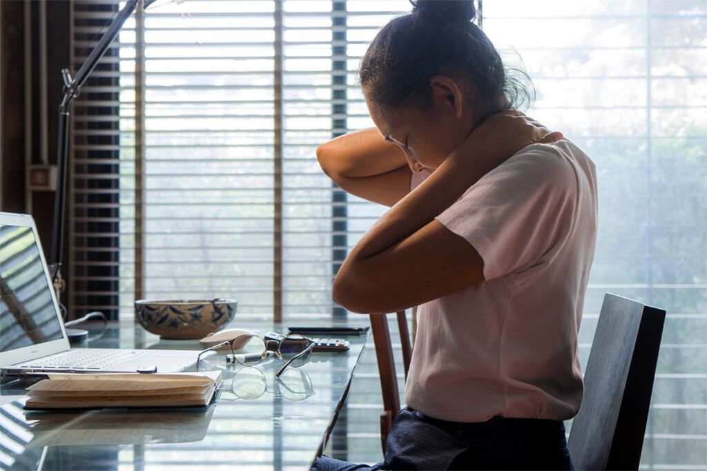 Woman with neck pain taking antidepressants for fibromyalgia