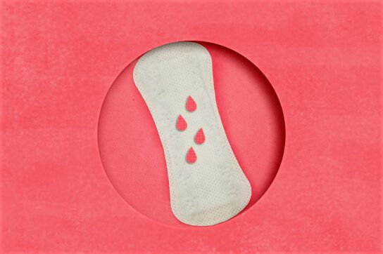 An animated image of a menstrual pad with pink droplets on its surface.
