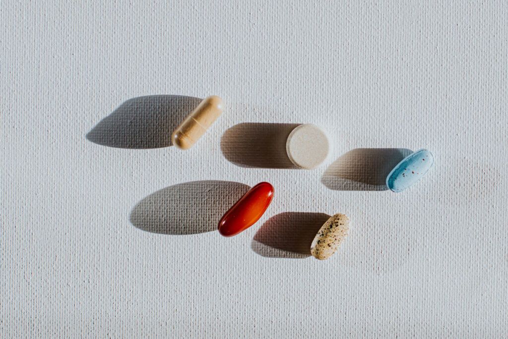 Close up of vitamin pills to depict natural antidepressant options.