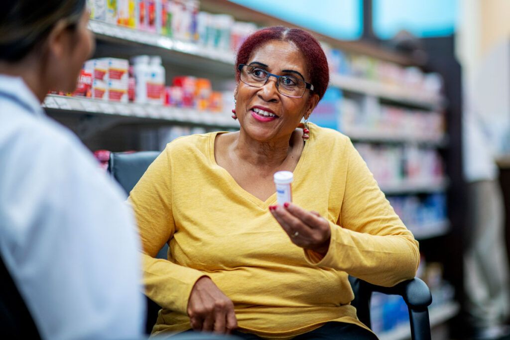 Woman asking pharmacist how to get semaglutide for weight loss