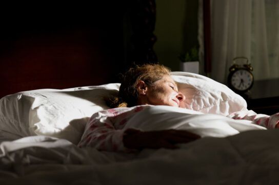 Woman sleeping soundly after taking sleeping pills safely