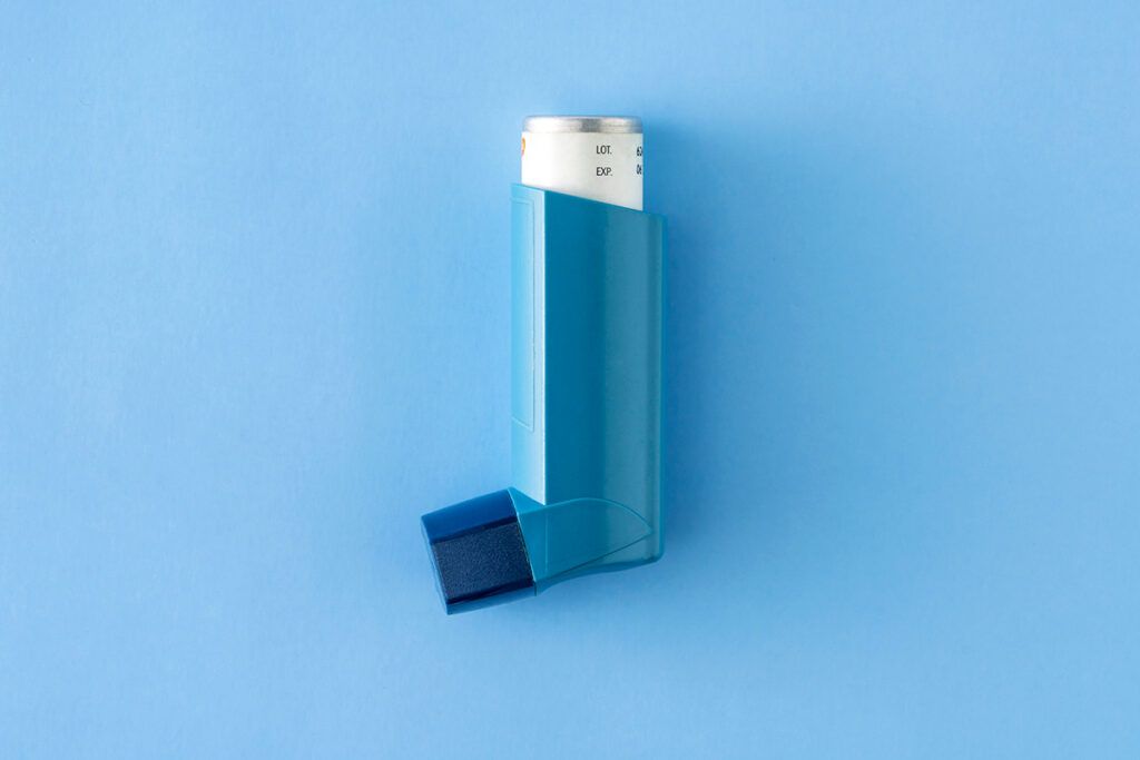 A picture of a reliever asthma inhaler as we look at the question why are inhalers so expensive?