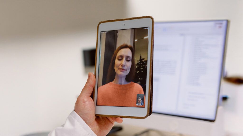 A person accessing online care via a tablet.